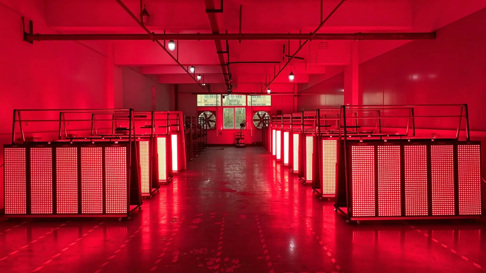 Aging test workshop for large LED red light therapy panels finished panels powered on for burn in quality inspection