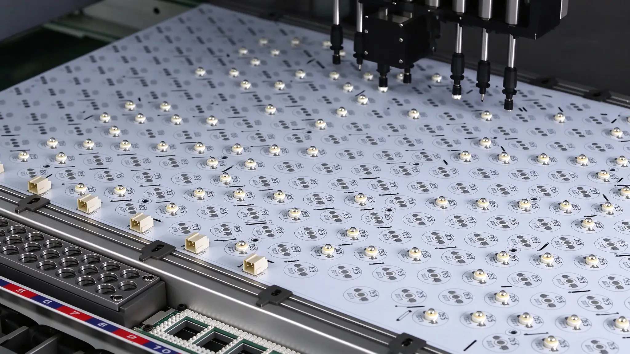 LED red light therapy panel SMT production line, automatic placement machine mounting LED chips on aluminum PCB board in factory workshop