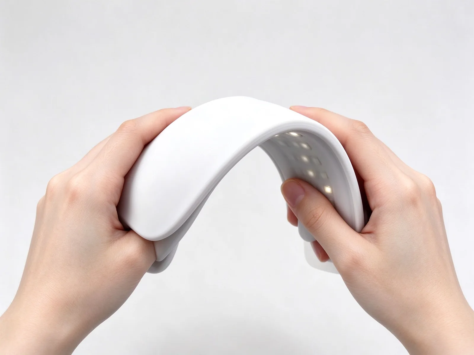 Liquid silicone light therapy mask bending flexibly